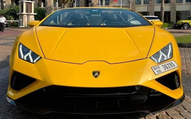 A yellow colour Farari car image